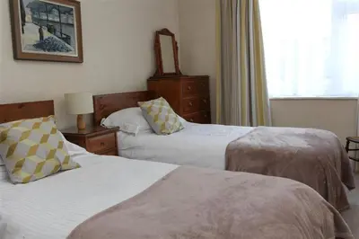 a hotel room with two beds and a window at 2 Bed in St Ives oc-fern41 in St Ives