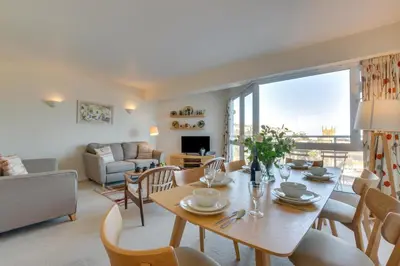 a living room with a table and chairs and a couch at 2 Bed in St Ives oc-fern42 in St Ives