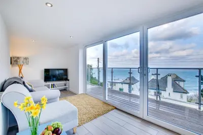 a living room with a view of the ocean at 2 Bed in St Ives oc-holm in Carbis Bay