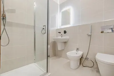 a bathroom with a shower and a toilet and a sink at 3 Bed in St. Ives oc-l26941 in Carbis Bay