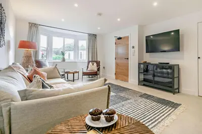 a living room with a couch and a tv at 3 Bed in St. Ives oc-l26941 in Carbis Bay