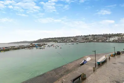 a large body of water with boats in it at 1 Bed in St Ives oc-lhse in St Ives