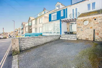 an empty street in front of a house at 2 Bed in St Ives oc-lookcv in St Ives