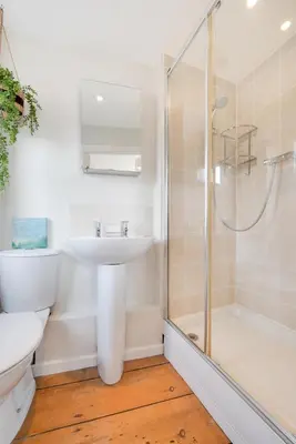 a bathroom with a sink and a shower at 3 Bed in St. Ives oc-marhou in St Ives