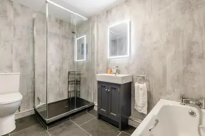 a bathroom with a sink toilet and a shower at 1 Bed in St Ives oc-nic01 in St Ives