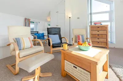 a living room with two chairs and a table at 2 Bed in St Ives oc-nic24 in St Ives