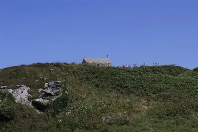 a house on top of a grassy hill at 1 Bed in St Ives oc-nic48 in St Ives