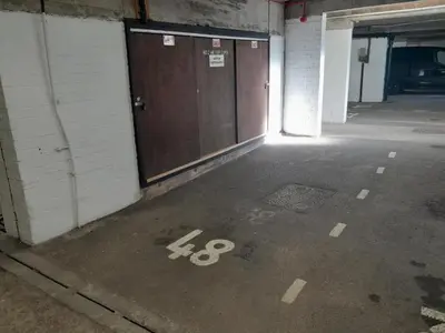 an empty parking garage with the number on the floor at 1 Bed in St Ives oc-nic48 in St Ives