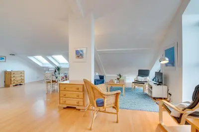 a living room with a couch and a table and chairs at 1 Bed in St Ives oc-nic48 in St Ives