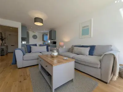 a living room with a couch and a table at 2 Bed in St Ives oc-pedtc1 in St Ives