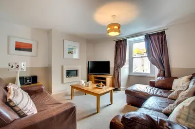 a living room with a couch and a table at 2 Bed in St Ives oc-pmho08 in St Ives