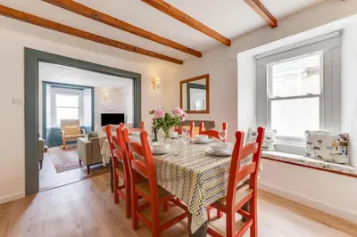 a dining room with a table and chairs at 2 Bed in St Ives oc-pmho10 in St Ives