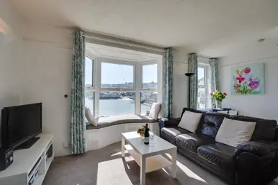 a living room with a couch and a window at 1 Bed in St Ives oc-quayst in St Ives