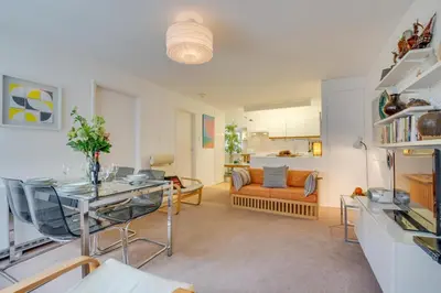 a living room with a table and a couch at 2 Bed in St Ives oc-redc4 in St Ives