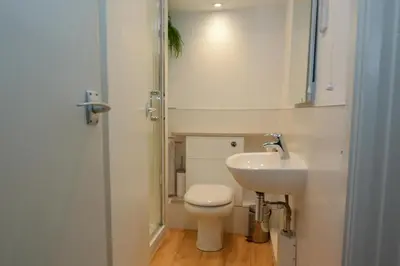 a small bathroom with a toilet and a sink at 2 Bed in St Ives oc-redc4 in St Ives