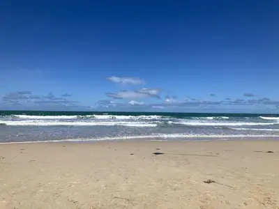 a sandy beach with the ocean in the background at 2 Bed in St Ives oc-shell in St Ives