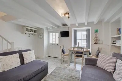 a living room with a couch and a table at 2 Bed in St Ives oc-stg019 in St Ives