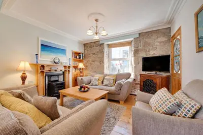 a living room with couches and a tv at 3 Bed in St Ives oc-twp32 in St Ives