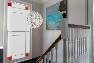a white staircase with a chandelier in a house at 4 Bed in St. Ives oc-uppcr in St Ives