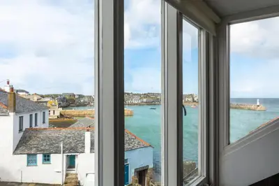 a view of the ocean from a window at 2 Bed in St. Ives oc-wesh4 in St Ives