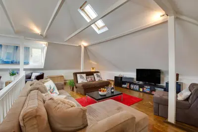 a living room with a couch and a tv at 2 Bed in St. Ives oc-wesh4 in St Ives