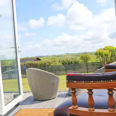 Coastal retreat surrounded by open countryside
