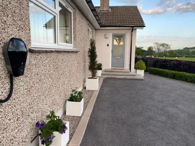 a front door of a house with potted plants at Ashlea in Launceston