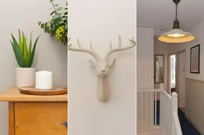 two images of a hallway with a wall with a deer head on it at Reflections in St Ives