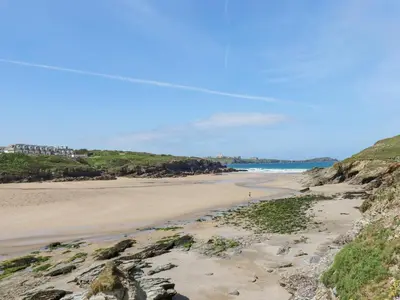 a view of the beach from the cliffs at 11 Ebbtide in Newquay
