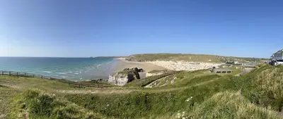 a view of a beach and the ocean at Porthcurno 4, Silverbow Country Park in Perranzabuloe