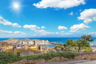 a view of a city with the ocean in the background at Island Studio with on-site parking in St Ives