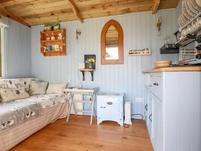 a living room with a couch and a table at Shepherds Retreat in Launceston
