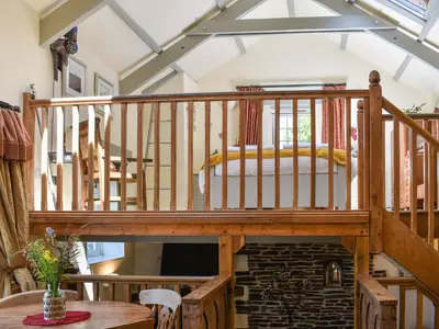 a wooden staircase in a house at The Old Chapel in Washaway
