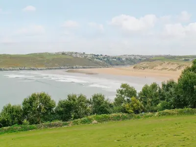 a view of the beach from a hill at Manor House in Crantock