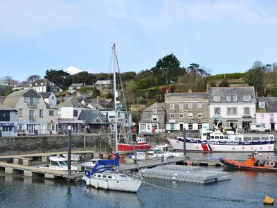 a group of boats docked at a dock in a harbor at Nan-Tis in St. Issey