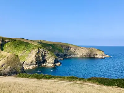 a small island in the middle of the ocean at Sea Thrift in Port Isaac