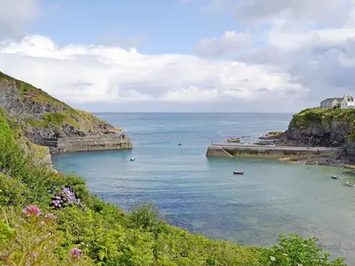 a view of a body of water with a beach at Atlantic House - 27665 in Port Isaac