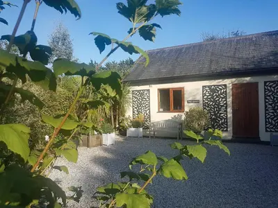 a house with a garden in front of it at Penty-Lowarth in Saint Columb Major