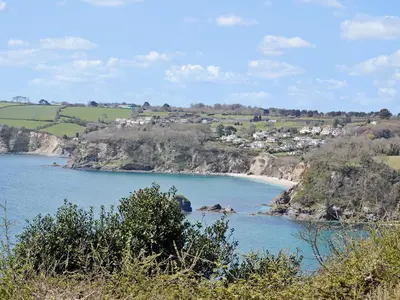 a view of a body of water with a beach at Millie's Place in Saint Stephen