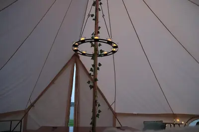 a chandelier hanging from a tent at Rescorla Retreats- Poldark in Mevagissey