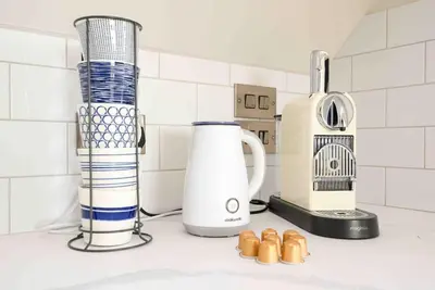 a kitchen counter with a juicer and a blender at Crow's Nest, Polperro in Polperro