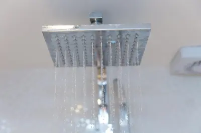 a shower head with water coming out of it at Spernenwyn in St Ives