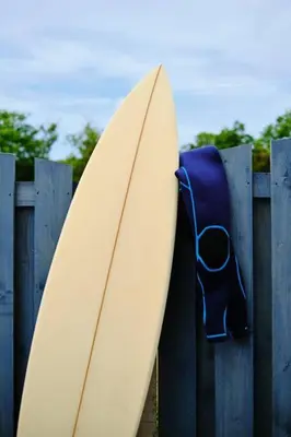 two surfboards leaning up against a wooden fence at Sunset View, near Gwithian & St.Ives Bay in Gwithian