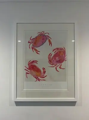 a framed picture of crabs on a wall at Contemporary 3-Bedroom Home with Stunning Views in Looe