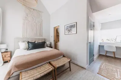 a bedroom with a bed and a bench in it at 3 Bed in Hayle oc-t27597 in Hayle