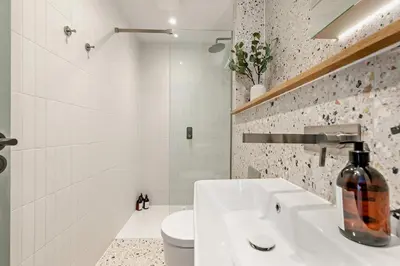 a white bathroom with a sink and a toilet at 3 Bed in Hayle oc-t27597 in Hayle