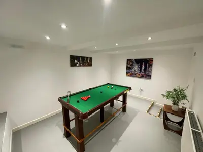 a billiard room with a pool table at Chy An Lur in Redruth