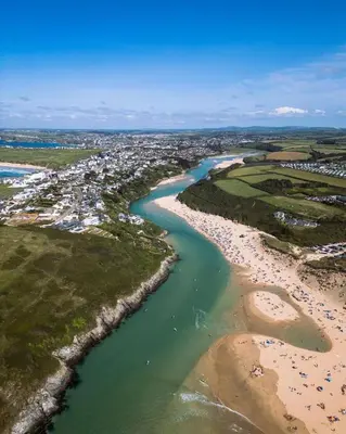 an aerial view of a beach and a river at LakeView Lodge Trevella Park in Crantock