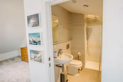a bathroom with a toilet and a sink at 3 Bedroom Holiday Home by beach in Newquay in Newquay