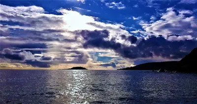 a cloud formation in the sky over a body of water at Schooner Point Guest House in Looe